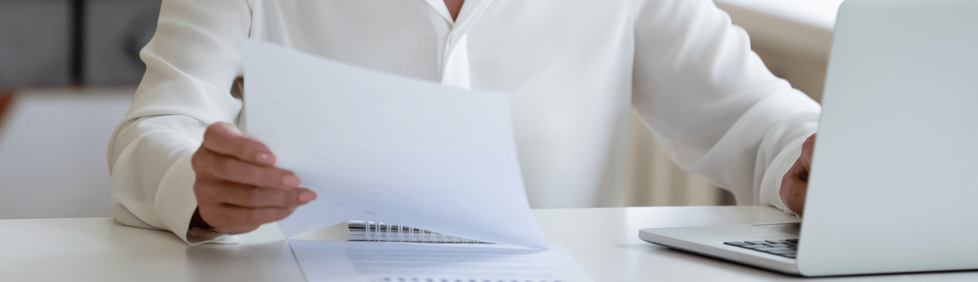 woman reading papers